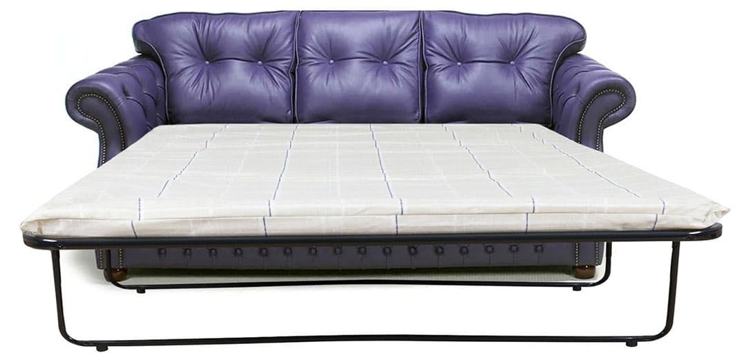 era sofá cama chesterfield de cuero azul